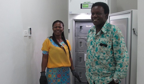 Picture of Two of FOOD's partners in Green Growth, Dr. Margaret Owusu and Dr. Wisdom Amoa at the -80 degrees freezer in the lab, FRI, Accra, Ghana