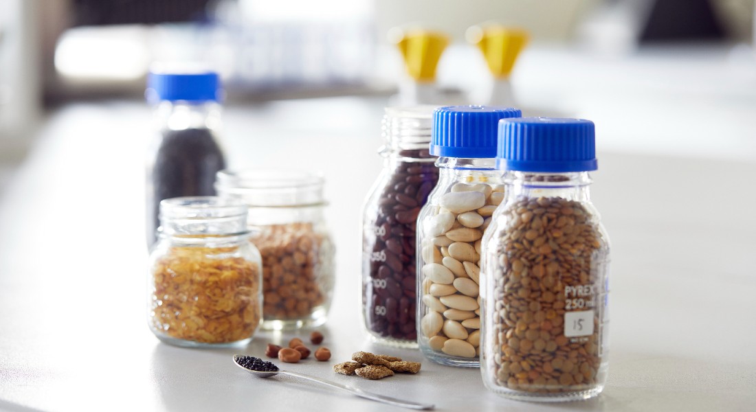 Different legumes and beans in jars Different legumes and beans in jars