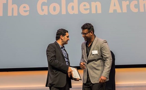 Venture Cup CEO Human Shojaee (left) presents  the Social Media award to PhD student Bhaskar Mitra. Picture: Venturecup.dk