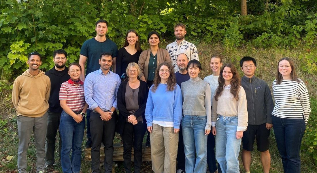 Picture of the research group standing outside